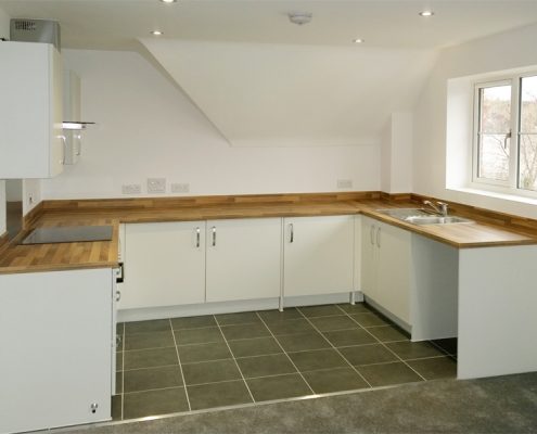 image of open-plan kitchen area of flat Eastleigh
