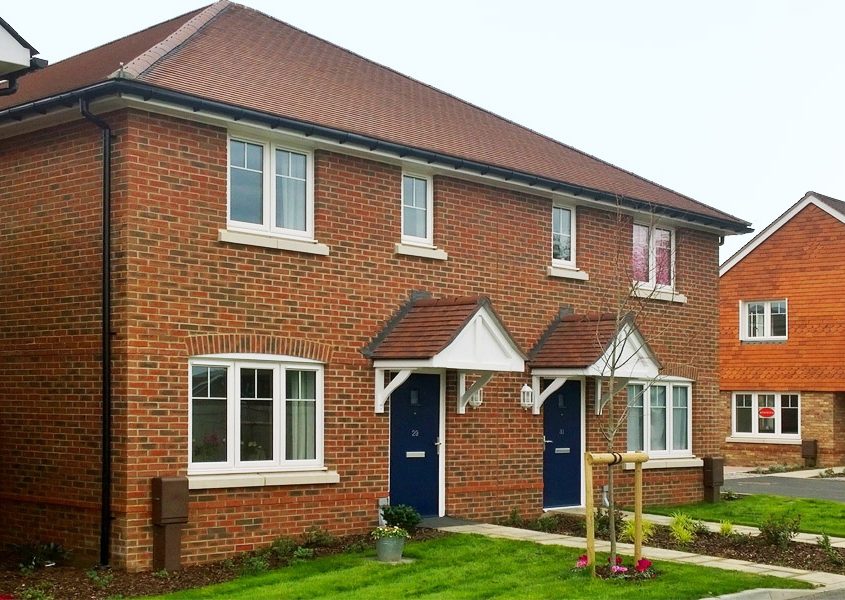 landscaped front of affordable homes